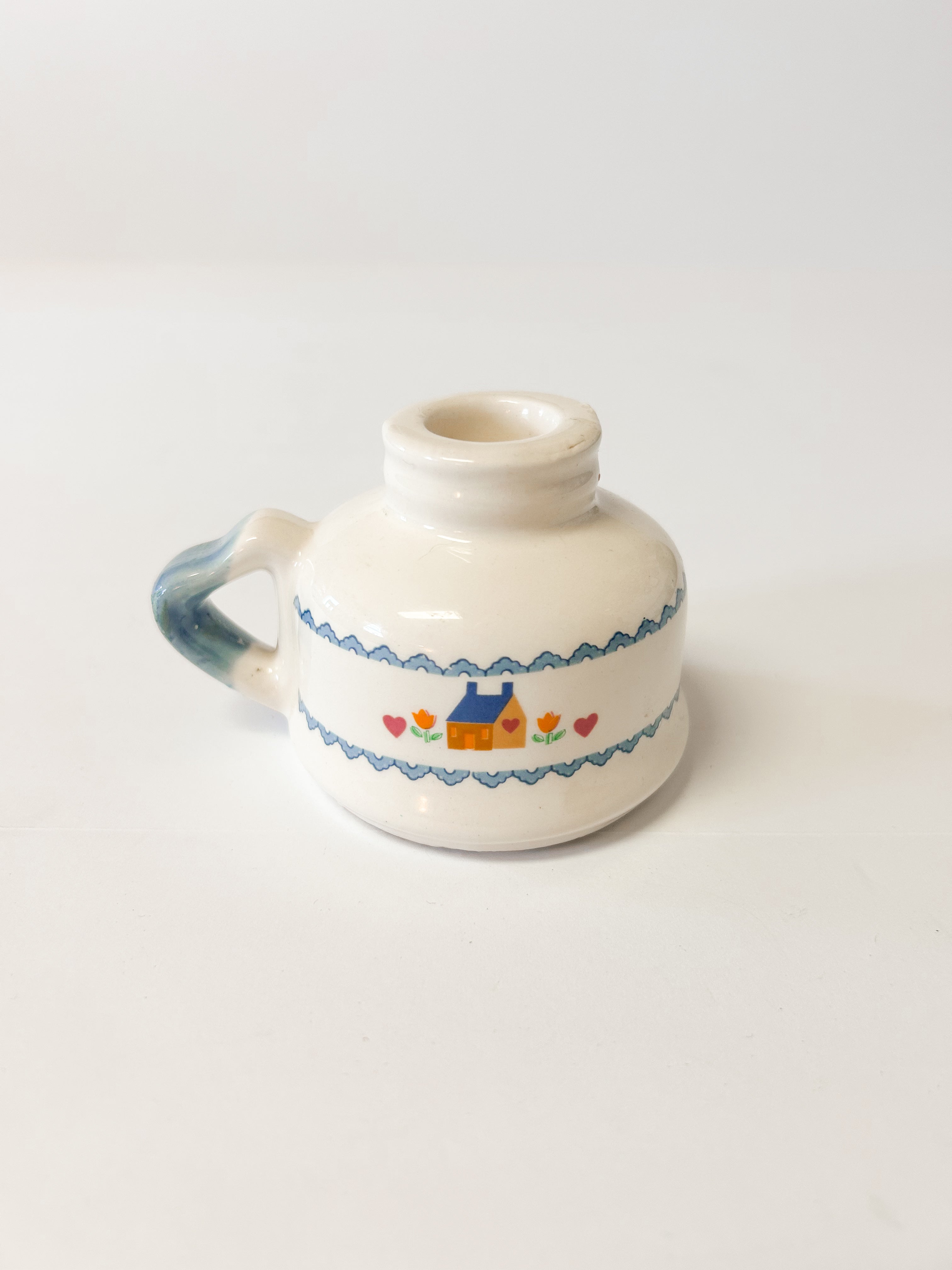 Country cottage style finger candle holder
