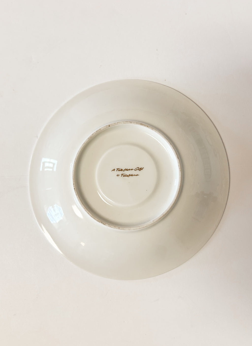 Blue and White Teleflora Saucer