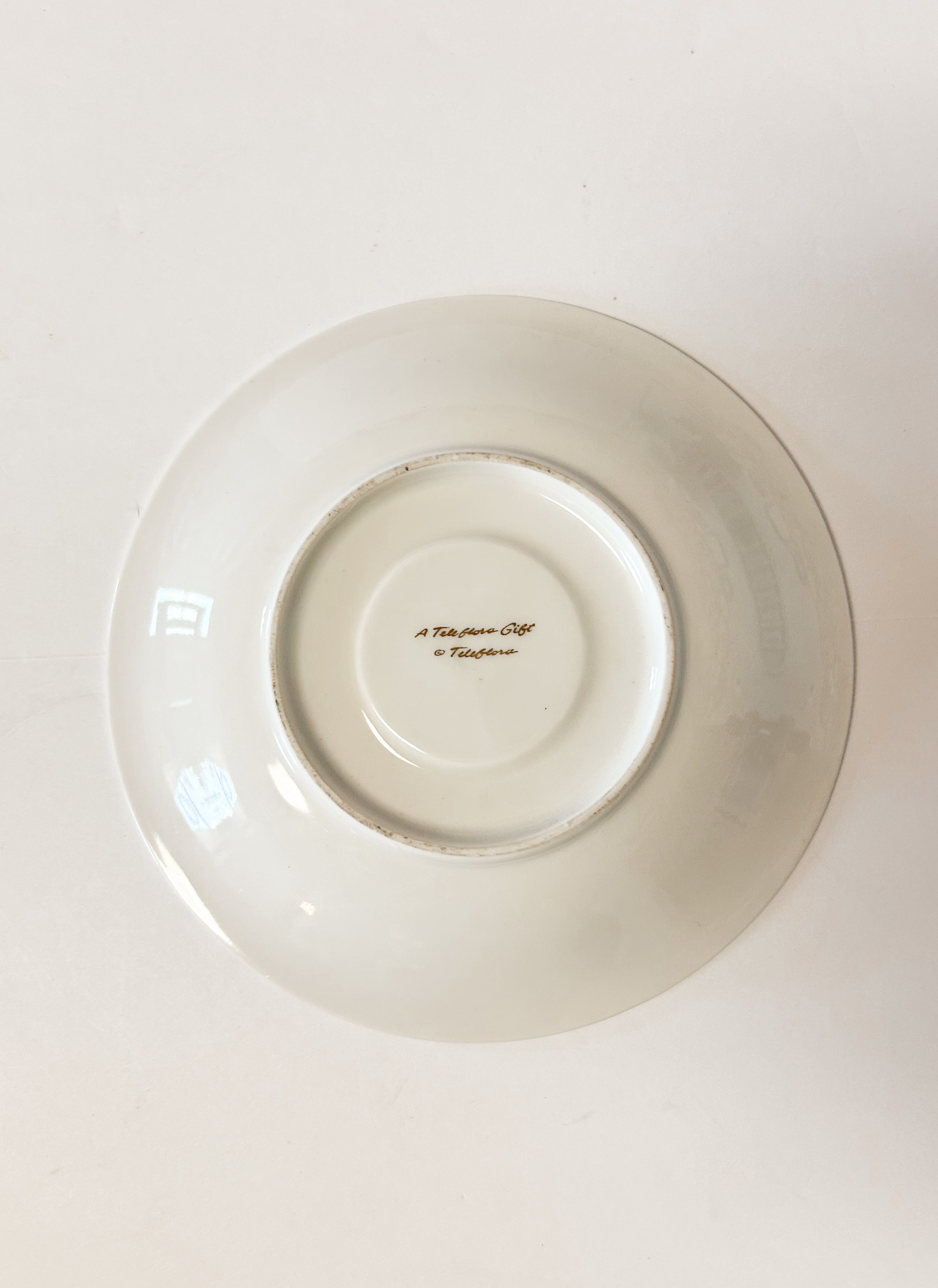 Blue and White Teleflora Saucer